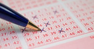 Man Choosing His Favourite Lotto Numbers 
